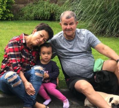 Ze Carlos Coutinho with his wife Dona Esmeralda Coutinho and grandkid.